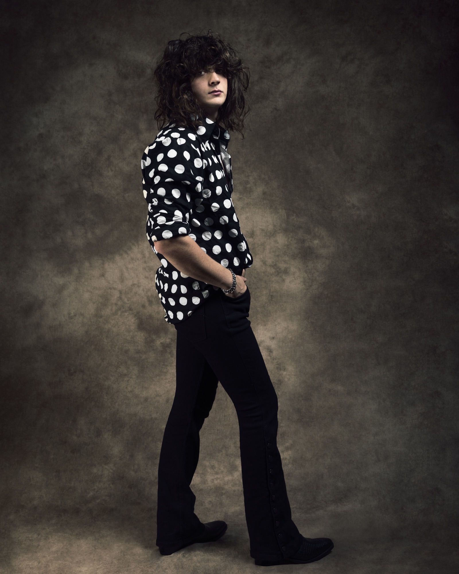 Full-length promotional portrait of Vancouver musician Markus Inkster