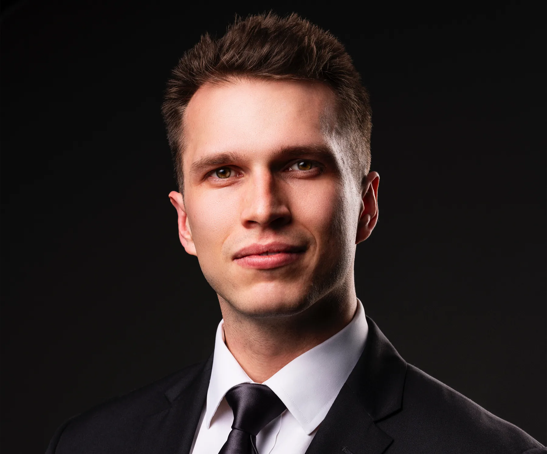 Corporate headshot photographed with dimensional studio lighting