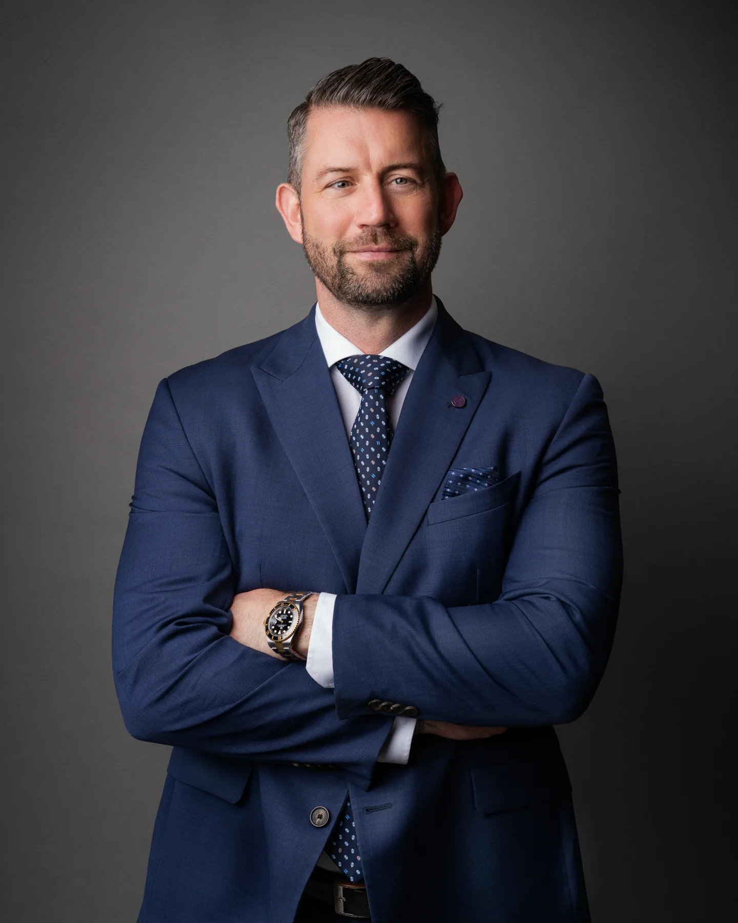 Executive branding portrait of a Vancouver businessman in a blue suit